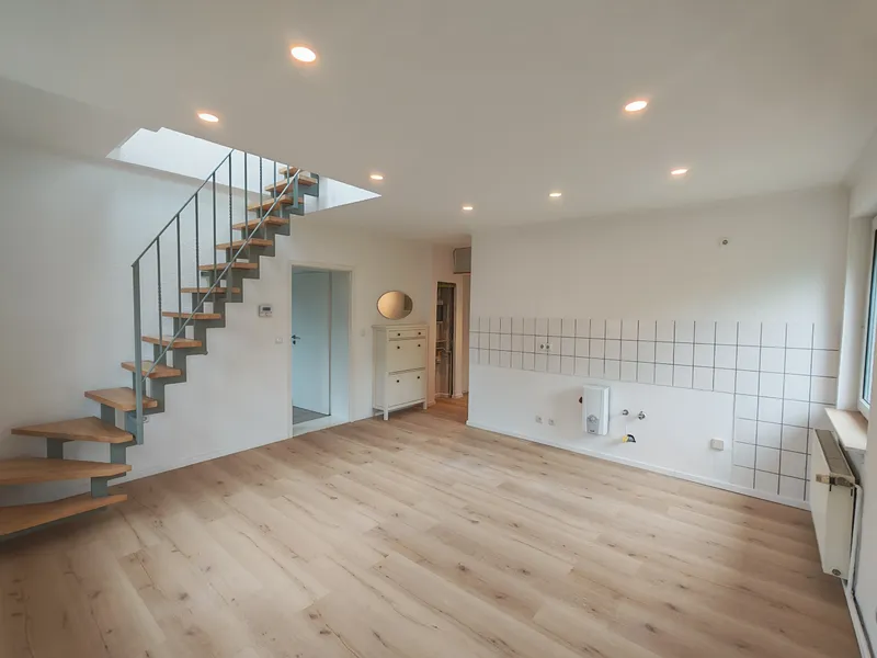 Frisch renovierte Maisonettewohnung mit Galerie und privatem Gartenanteil — photo 1